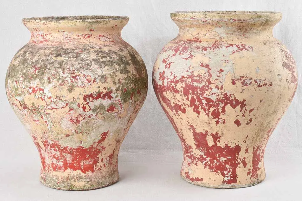 2 Willy Guhl planters with red & beige patina 18½"